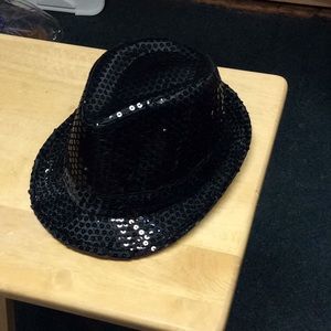 Black sequin hat that flashes solid or blinking